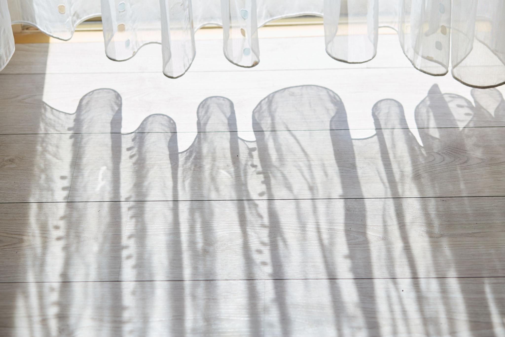 Morning light filtered through sheer curtains — the quiet before a session begins