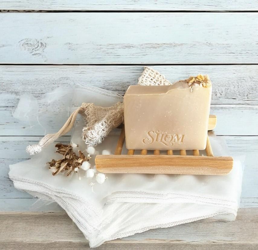 Silom Jax signature soap on natural wood tray — handcrafted with honest, traceable ingredients